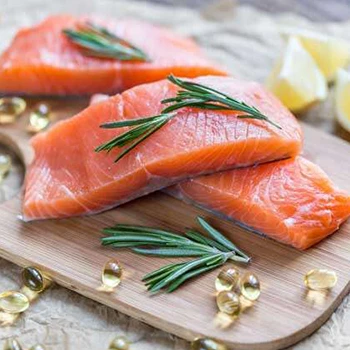 A raw salmon on a wooden board perfect for keto diet