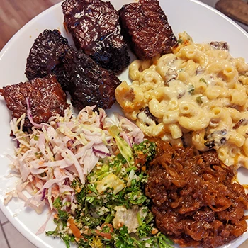A plate of burnt ends with different sides