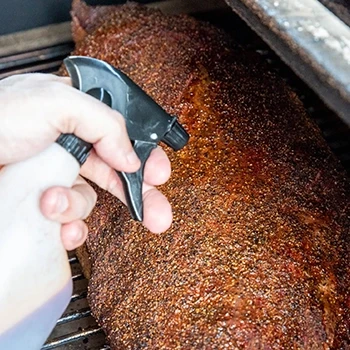 Spritzing brisket for better bark