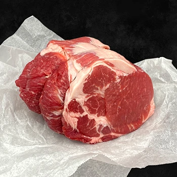 A piece of raw pork shoulder meat perfect for making a pulled pork