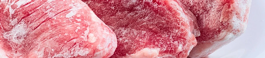 A close up shot of frozen steak ready for defrosting