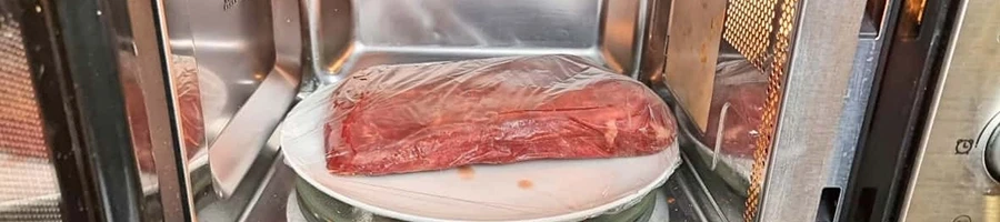 Defrosting frozen steak using the microwave