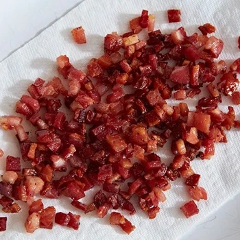 A top view of cooked pancetta cubes