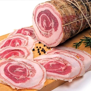 A pancetta on a wooden board