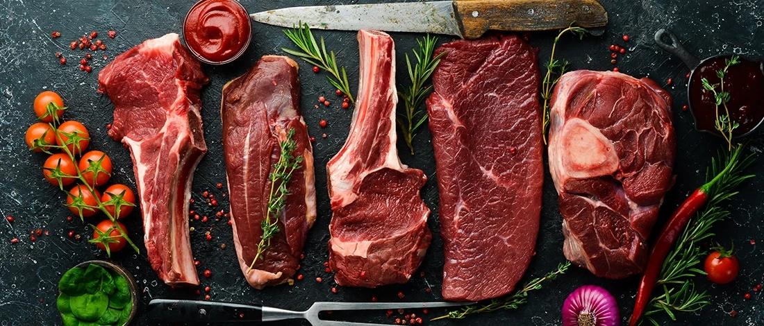 A top view of beef meat in different cuts