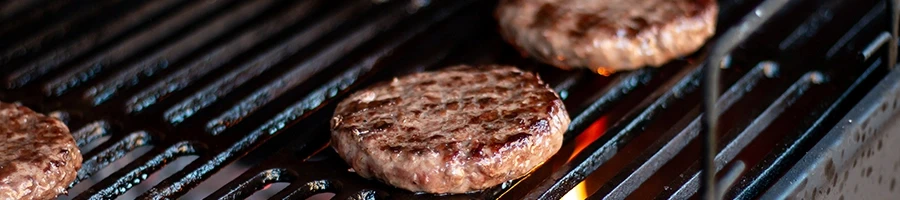 Cooking burgers on the grill without keeping them from falling apart