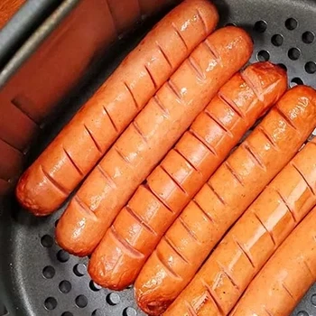 A top view of cooked hotdogs ready to be stored in the fridge