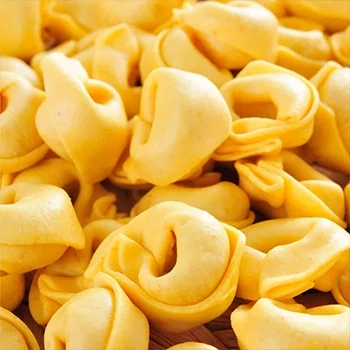 A close up shot of uncooked tortellini to be stored in the fridge