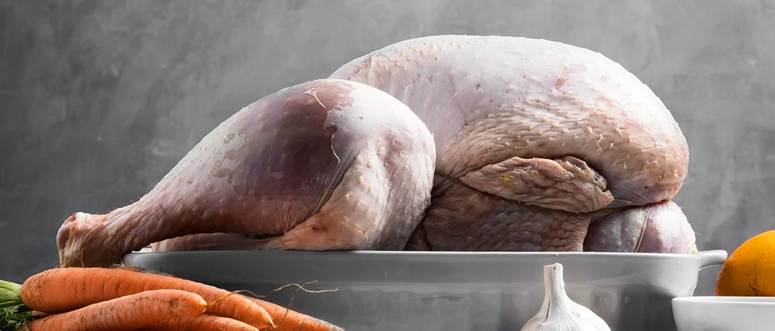 A raw turkey ready to be stored inside the fridge
