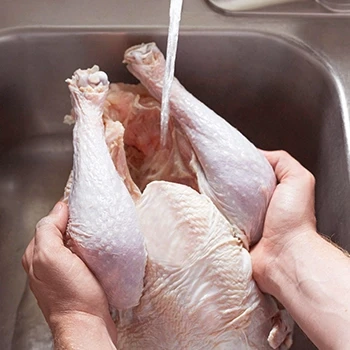 Thawing frozen turkey using cold water