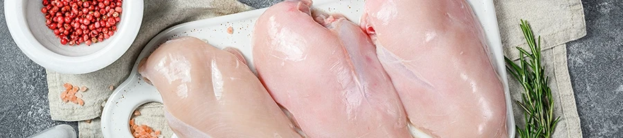 A top view of fresh chicken breasts ready to grill