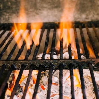 A close up shot of the grill being preheated