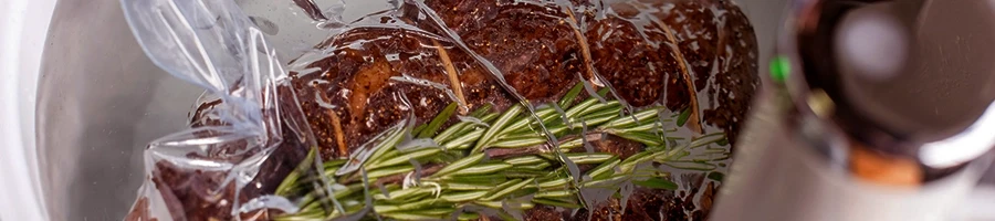 A top view of a steak being reheated by Sous Vide machine