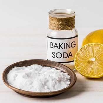 A close up shot of baking soda and lemons