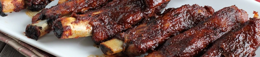 A close up shot of delicious St. Louis style ribs