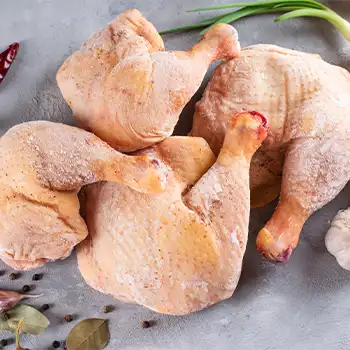 a photo of a chicken thigh and leg being refrigerated