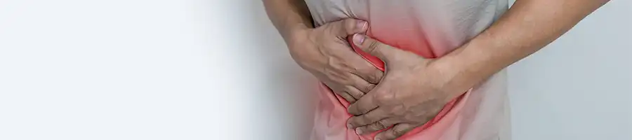 an image of a person experiencing a stomach ache