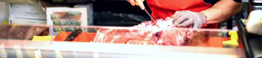 man shows ways of cutting bones off meat