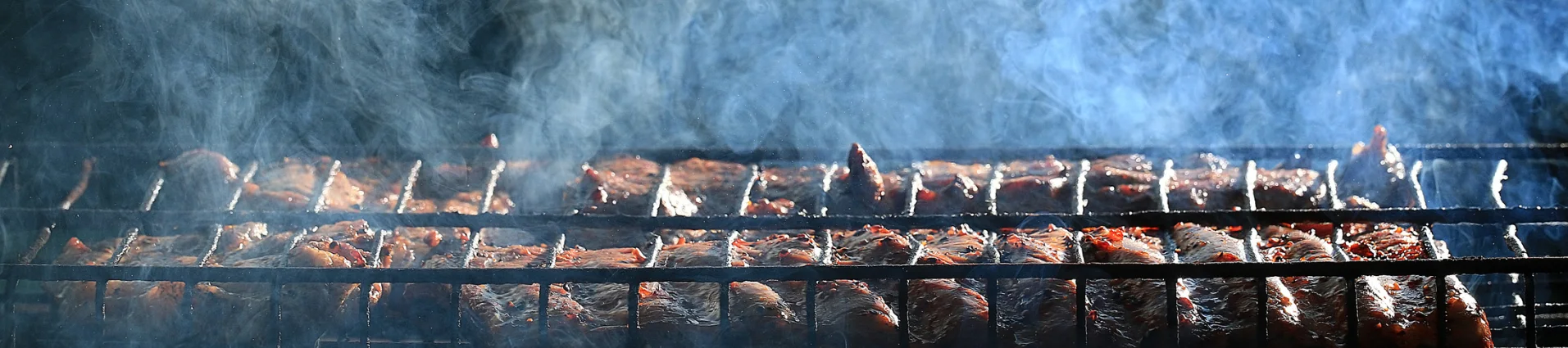 Steak smoking on the grill