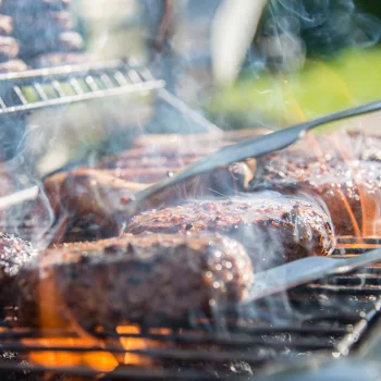 Meat cooking on the grill