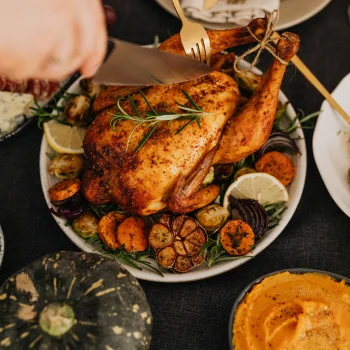 Person cutting a turkey