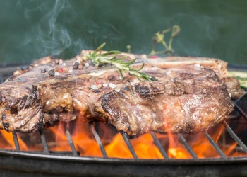 smoked T-bone steak on the grill