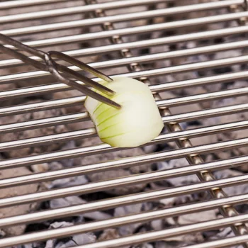 Cleaning a grill with an onion