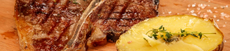 T-bone steak with a pineapple