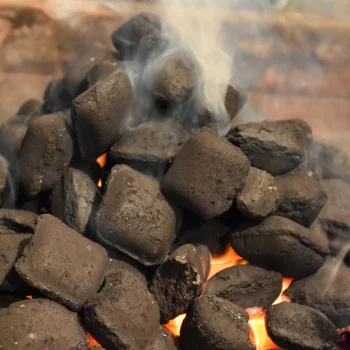 stacking the charcoal vertically on a grill