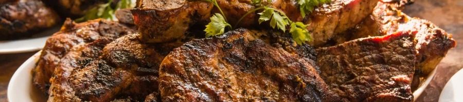 Grilled eye of round steak on a plate