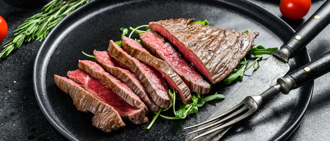 A perfectly cooked flank steak using an air fryer