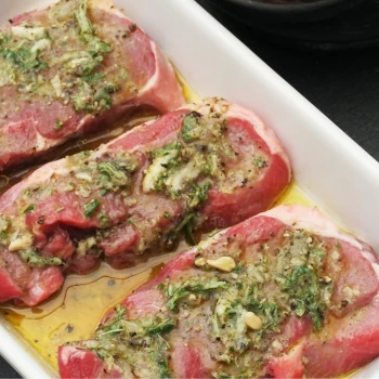 A close up shot of marinated beef chuck steak