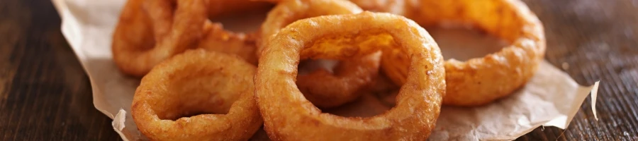 A close up shot of crispy onion rings