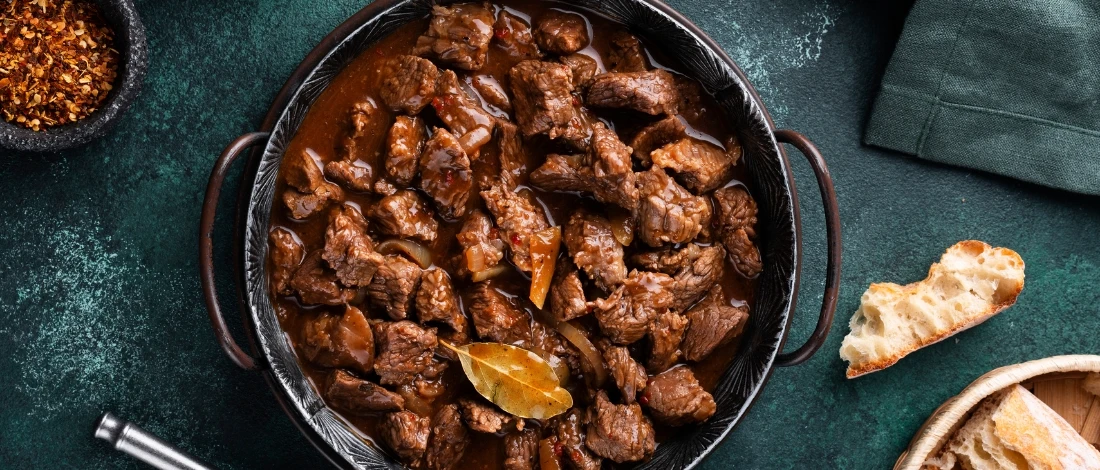 A top view of a delicious adobo steak in a pot