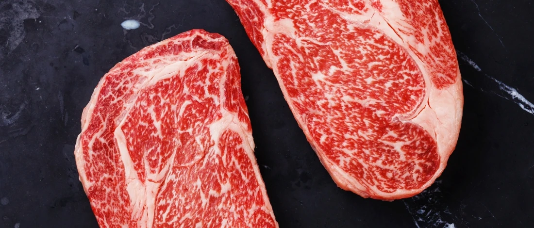 A top view of two marbled meat