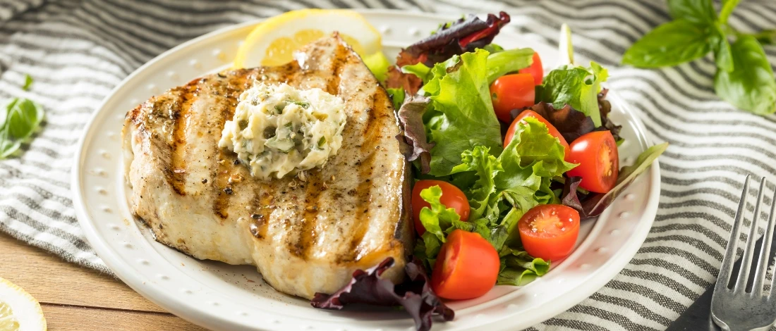 Air-fried swordfish steak on a plate