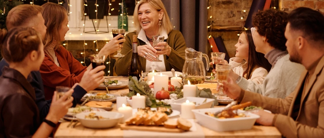 A family eating foods with beef