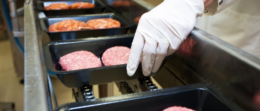 A ground meat was packed in a container