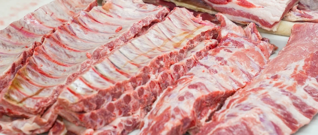 A close up shot of raw beef back ribs