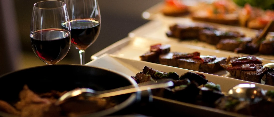 A served meal and wine in a restaurant