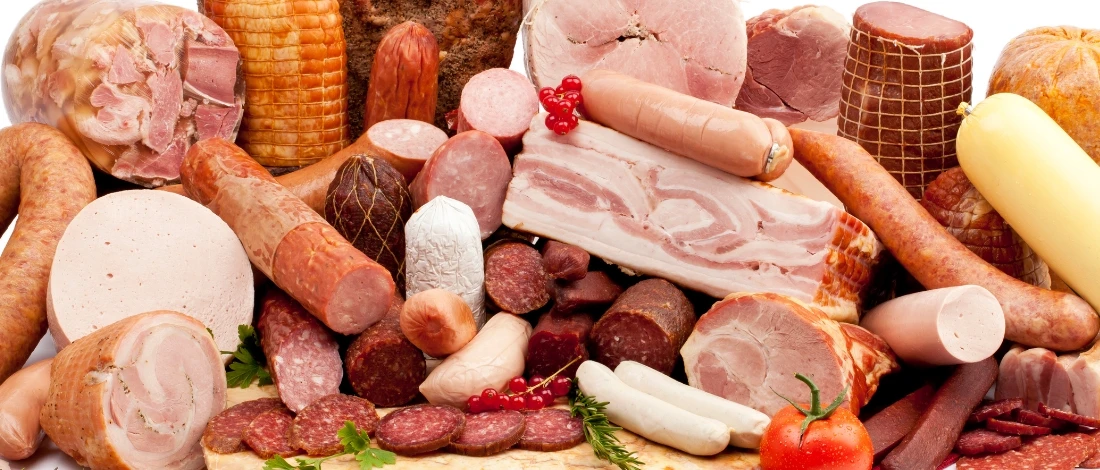 A various deli meats on a table