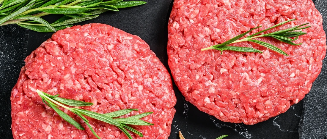 A raw burger patty