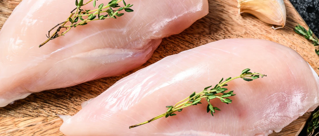 Chicken meat on table of meat institute