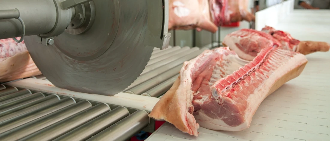 a meat being processed in a facility