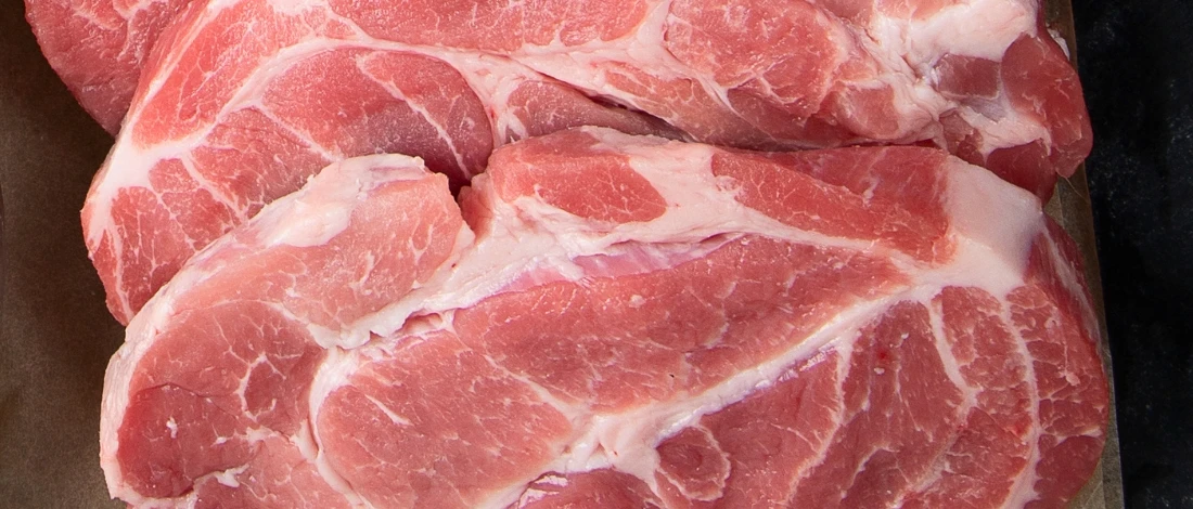 A pinkish sliced meat