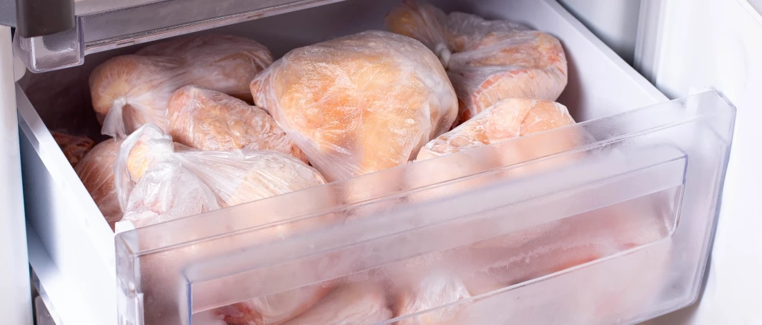 The frozen turkey meat in a fridge