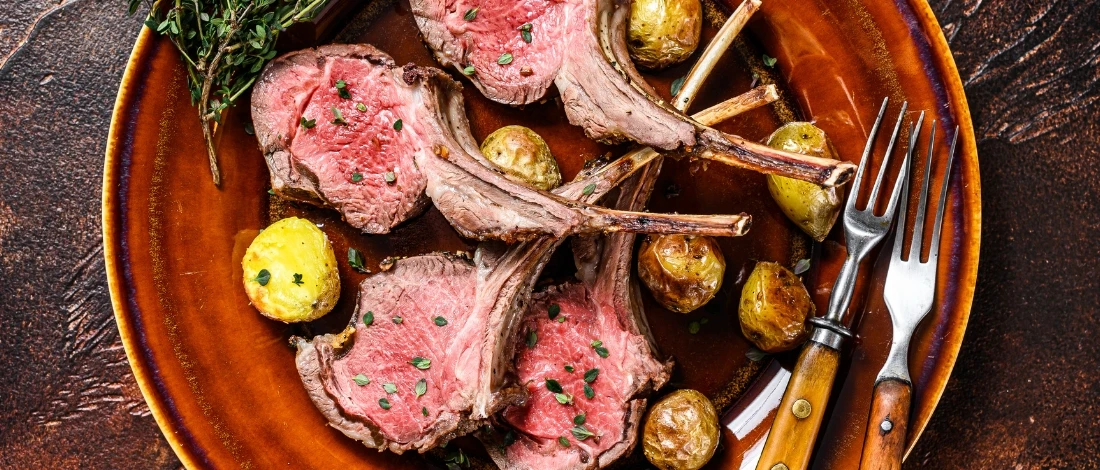 A sliced lamb chops on a plate