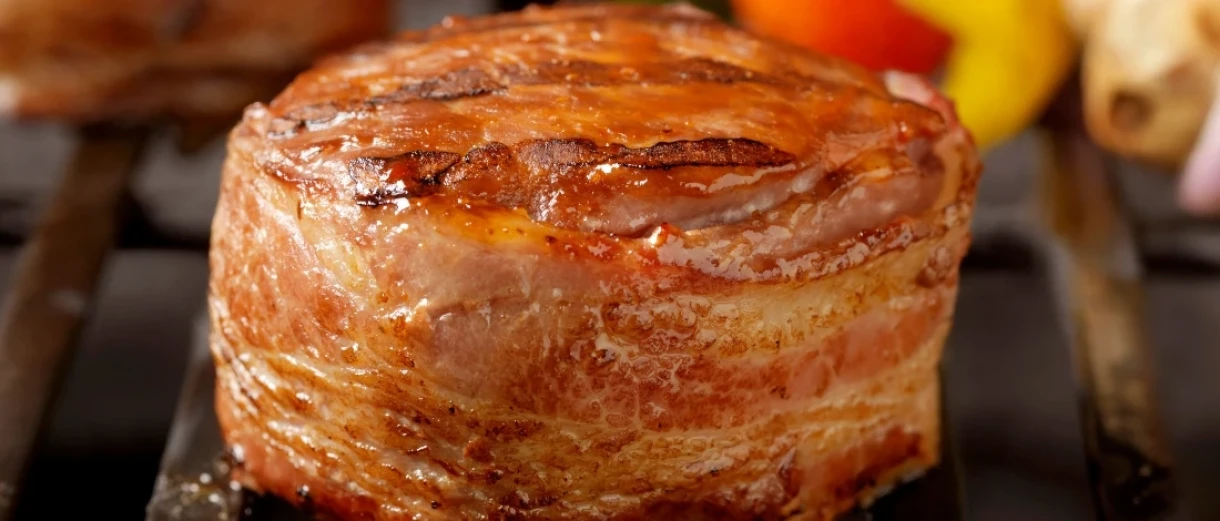 A mouthwatering bacon wrapped steak