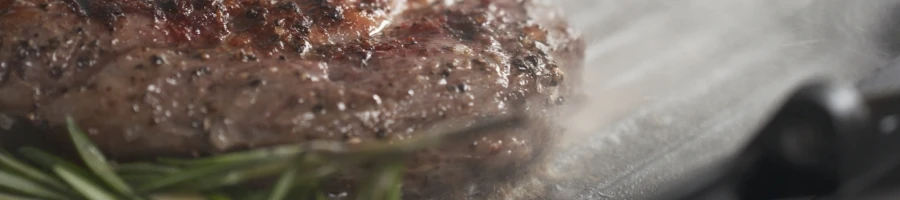 The beef steak cooked on a pan