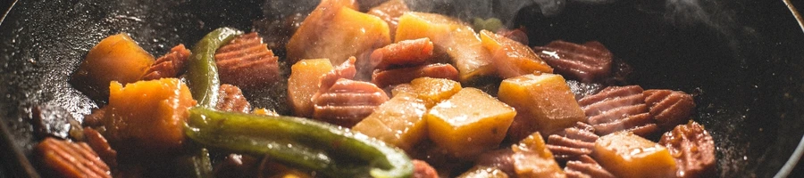 A roasted vegetables in a pan